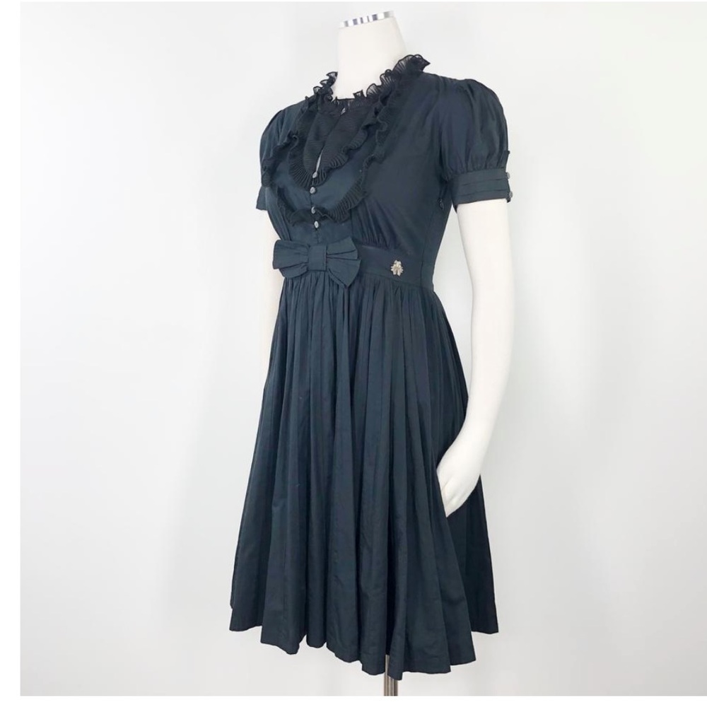 Beautiful John Galliano size 40 black dress in a very good pre-owned condition.
